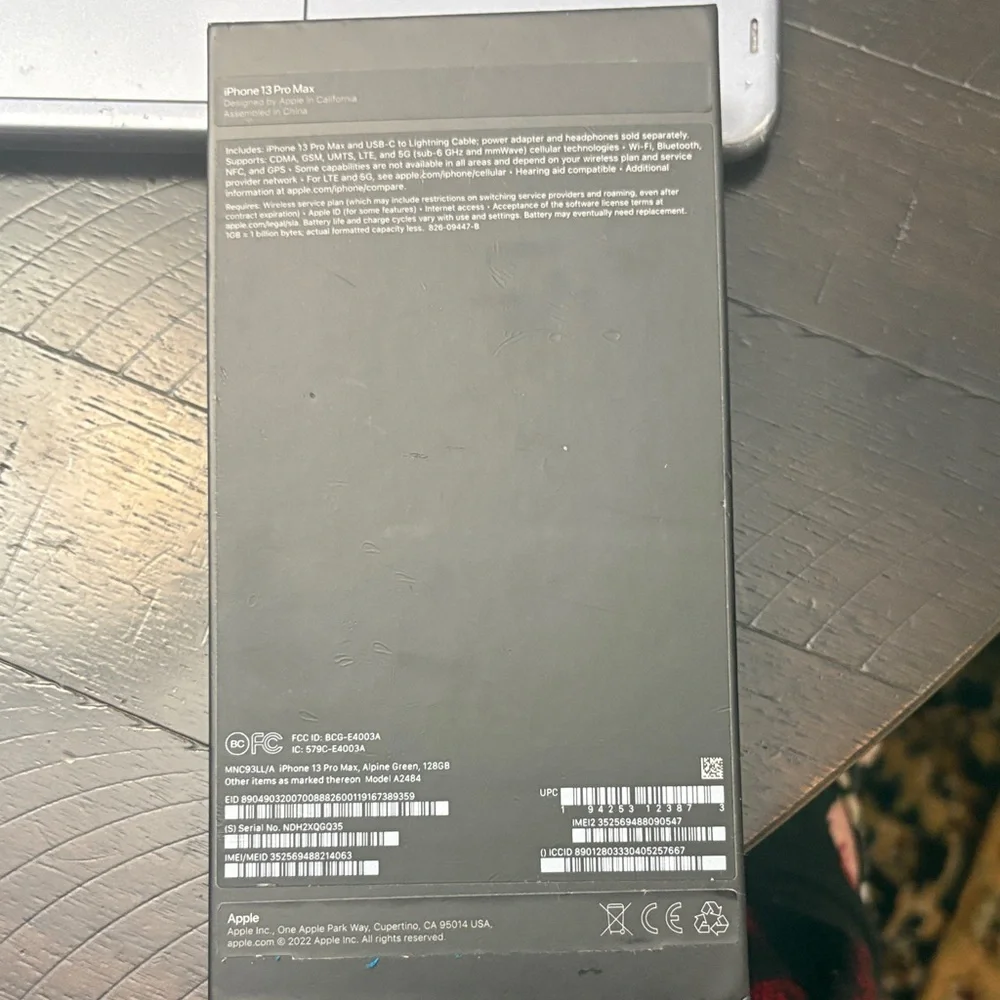Apple Smartphone with White Charging Cable